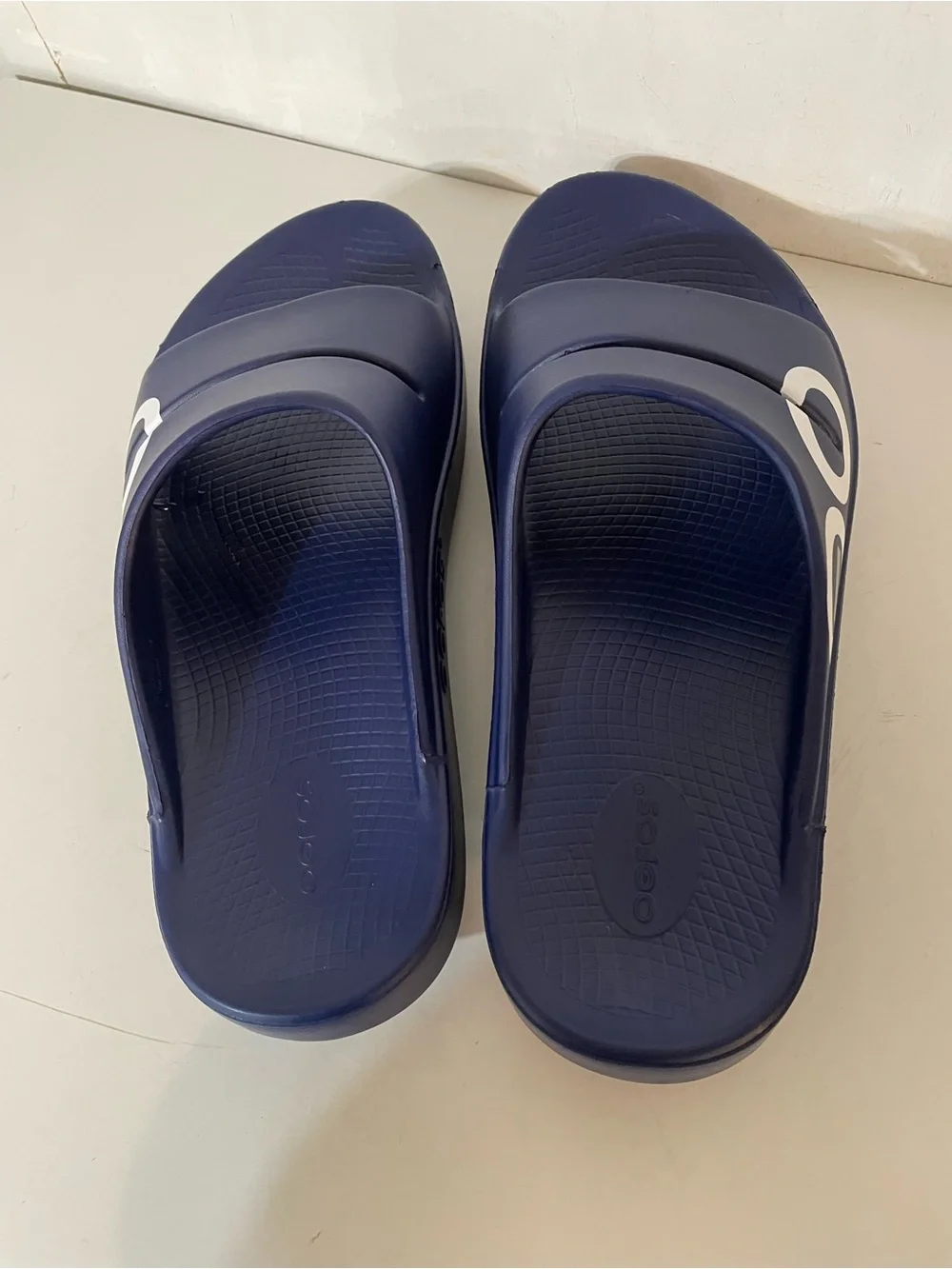 Oofos Slides in Navy Blue